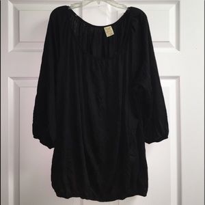 Black blouse with elastic arms and waist.
